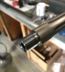 Barrel threaded for a muzzle brake