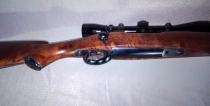 Custom sporterized Mauser with a hand-shaped walnut stock