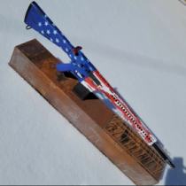 Battle-worn American flag cerakote job on AR-10